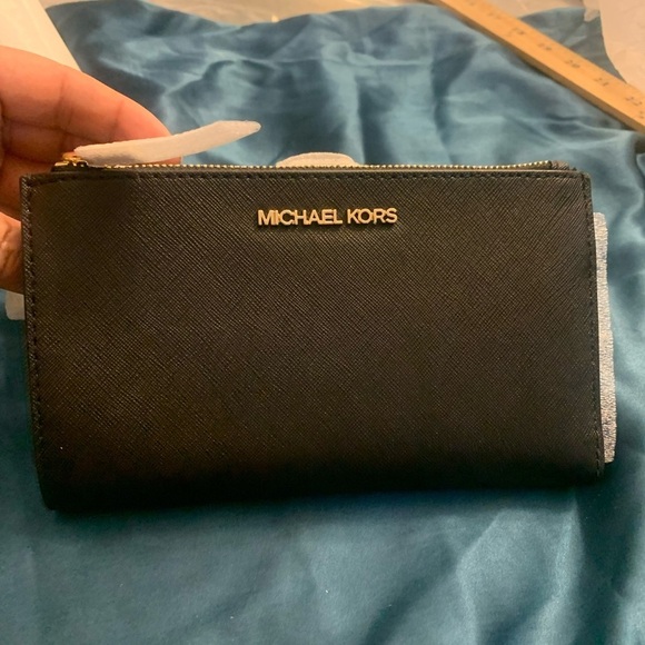 Michael Kors Accessories - Michael Kors Jet Set Black Travel Wallet NWT